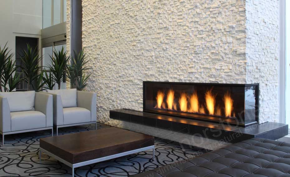 Three Story Natural Stacked Stone Veneer Fireplace in Norstone White Quartz Rock Panels in Edmonton