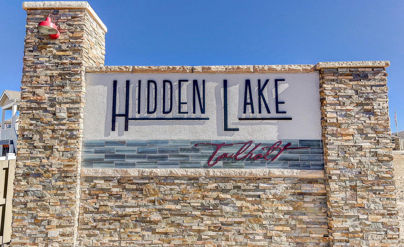 Exterior Ochre Rock Veneer Used on Subdivision Sign Entryway